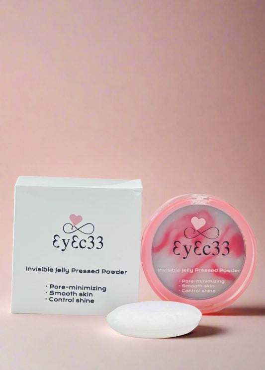 Eyec33 pressed powder with packaging on a pink background